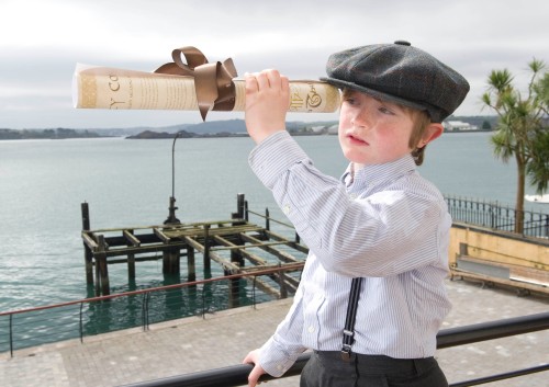 Master Reuben at the back of the James Scott offices. The pier in the background is 'Titanic Pier' where steerage passengers embarked for the Titanic aboard the tender 'America' (Photo: Gerard McCarthy, thanks to Titanic Experience Cobh)